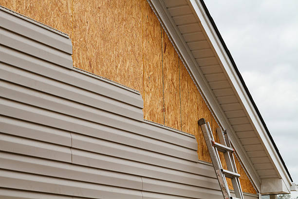 Professional Siding technician working in Williamsport, PA